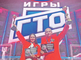 Знак ГТО на груди у него!